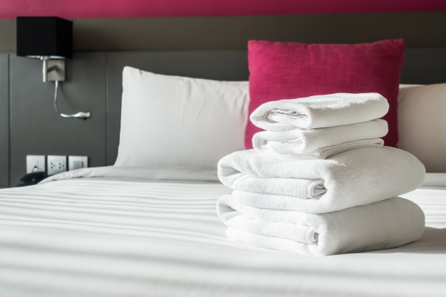folded-towels-bed_1203-973.jpg